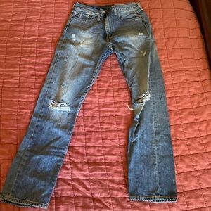Levi’s 513 distressed jeans 31x32